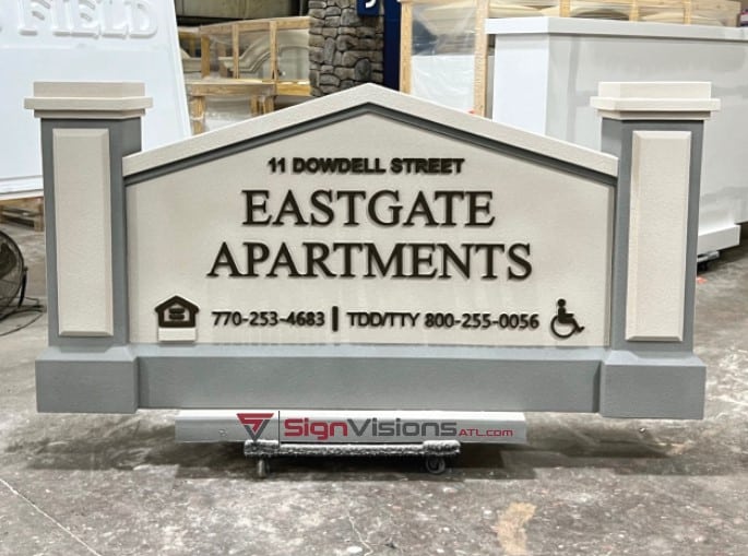 Adding the lettering and logo elements to an Apartment Monument Sign